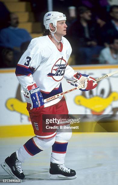 Dave Manson of the Winnipeg Jets skates on the ice during an NHL game circa 1993 at the Winnipeg Arena in Winnipeg, Manitoba, Canada.
