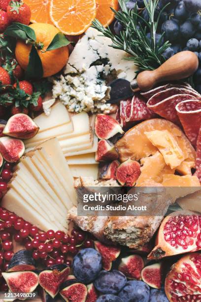 charcuterie plate - cutting board stock pictures, royalty-free photos & images