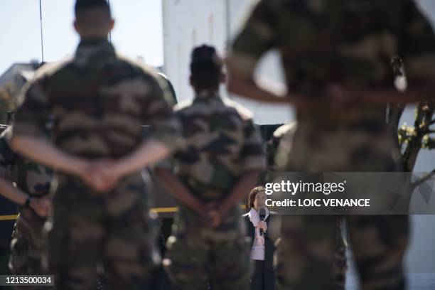 French Defence Minister Florence Parly speaks to soldiers of the 3d RIMA in Vannes, western France, on May 18, 2020 after France eased lockdown...