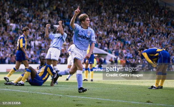 City player Gary Flitcroft celebrates after scoring in a 1-1 draw FA Premier League match with Leeds United as Leeds players David O' Leary, Chris...