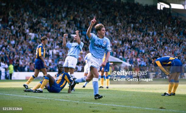 City player Gary Flitcroft celebrates after scoring in a 1-1 draw FA Premier League match with Leeds United as Leeds players David O' Leary, Chris...