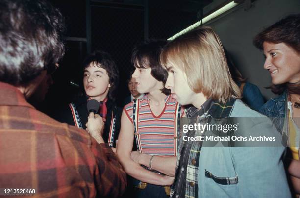 Scottish pop rock band the Bay City Rollers, circa 1975. Guitarist Stuart Wood is in the middle with drummer Derek Longmuir to the right.