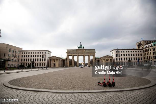 Almost empty Pariser Platz by the Brandenburg Gate on March 19, 2020 in Berlin, Germany. Everyday life in Germany has become fundamentally altered as...