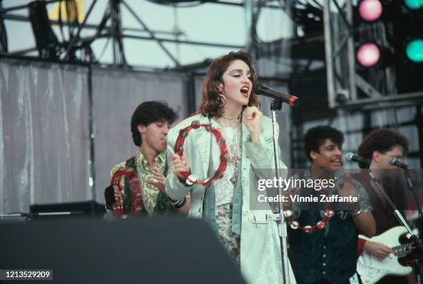 American singer Madonna takes part in the Live Aid benefit concert at the John F Kennedy Stadium in Philadelphia, USA, 13th July 1985.