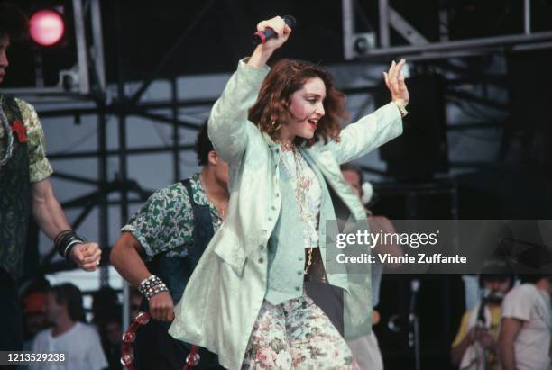 American singer Madonna takes part in the Live Aid benefit concert at the John F Kennedy Stadium in Philadelphia, USA, 13th July 1985.