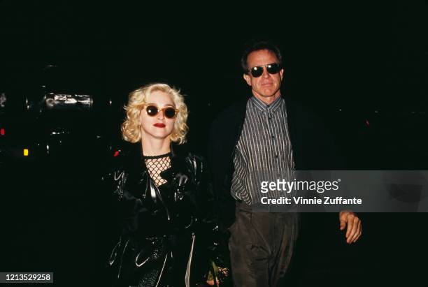 American singer Madonna and actor Warren Beatty in New York City, 24th June 1990.