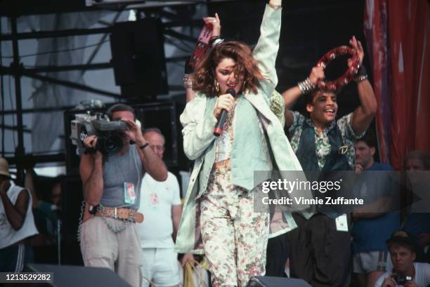 American singer Madonna takes part in the Live Aid benefit concert at the John F Kennedy Stadium in Philadelphia, USA, 13th July 1985.