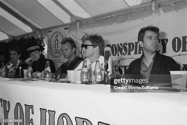 From left to right, singers Joan Baez, Bono, Sting, Bryan Adams and Peter Gabriel during a press conference for the Conspiracy of Hope benefit...