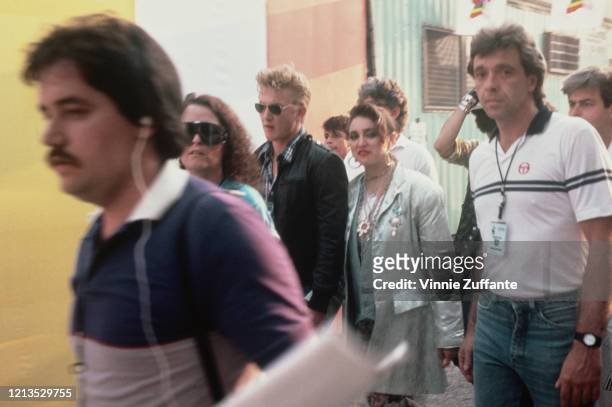 American singer Madonna with her partner, actor Sean Penn at the John F Kennedy Stadium in Philadelphia, USA, for the Live Aid concert, 13th July...