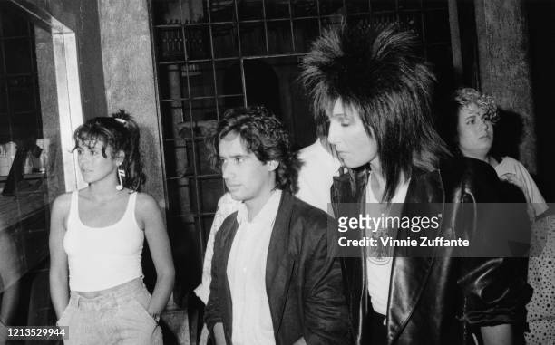American singer Cher with musician John Benitez, aka Jellybean, at the Area club in New York City, circa 1988. Actress Maria Conchita Alonso is on...