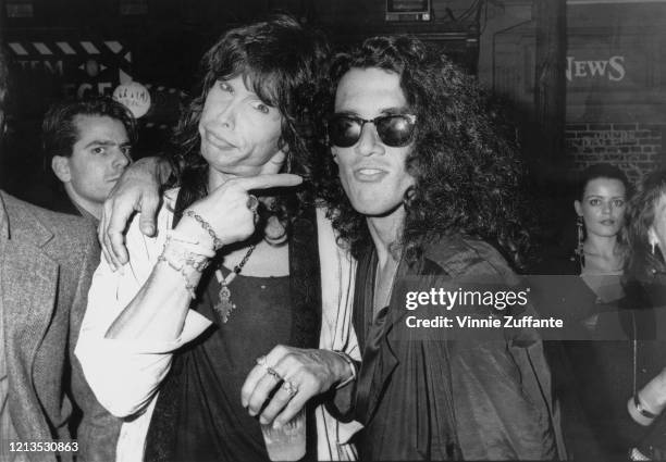 Singers Steven Tyler of rock band Aerosmith and Stephen Pearcy of heavy metal band Ratt after the MTV Awards closing ceremony at the Universal...