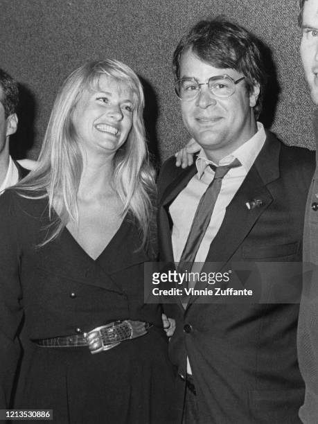 Canadian actor and comedian Dan Aykroyd and his wife, actress Donna Dixon at the Emmy Awards in Los Angeles, circa 1985.
