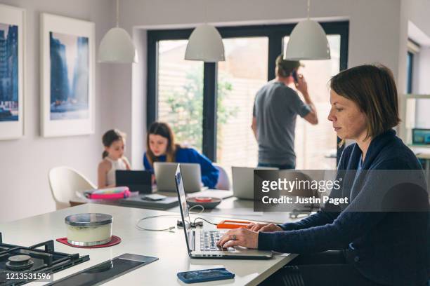 parents and children all working from home - quarantine stock pictures, royalty-free photos & images