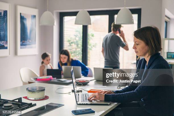 parents and children all working from home - social distancing family stock pictures, royalty-free photos & images