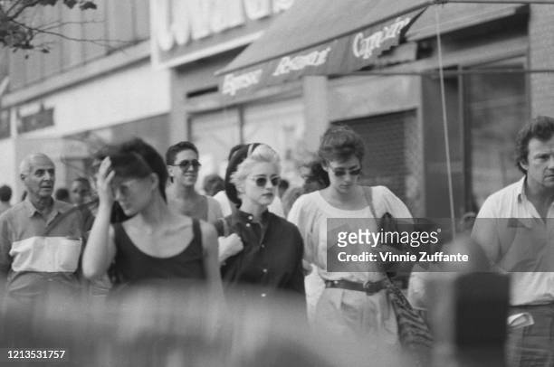 American singer and actress Madonna with actress Lorraine Bracco and actor Harvey Keitel in New York City, 1986. All three are starring in the play...