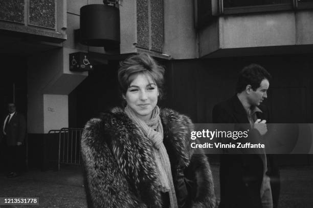 American actress Tatum O'Neal with her partner, tennis player John McEnroe, 12th January 1987.