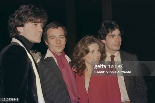 The cast of the film 'The Idolmaker', USA, 1980. From left to right, they are actors Paul Land, Ray Sharkey, Tovah Feldshuh and Peter Gallagher.