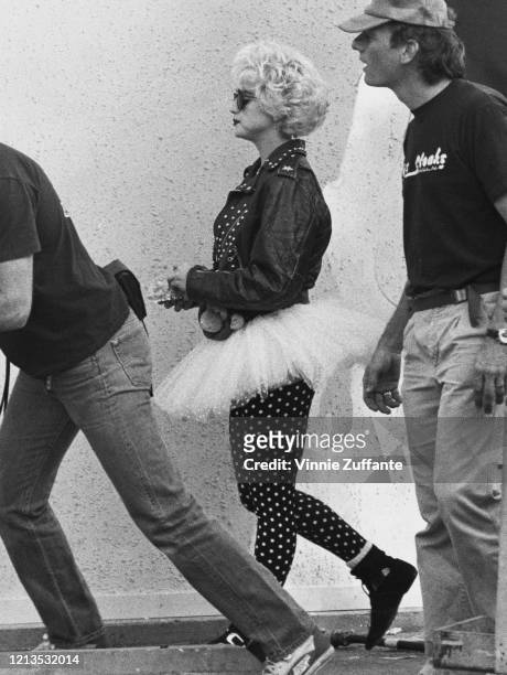 American singer and actress Madonna during the filming of 'Slammer', later titled 'Who's That Girl?', USA, 1987.