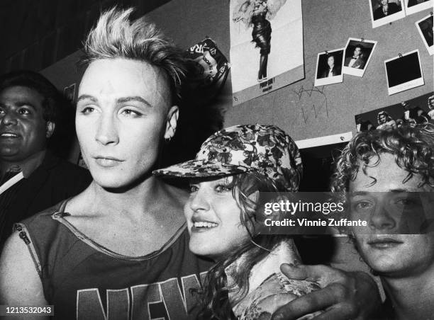 American singer Madonna and British singer Marilyn celebrate Boy George's birthday at the Palladium nightclub in New York City, 1985. On the right is...