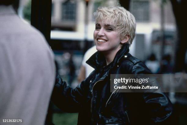 American singer and actress Madonna filming the video for her song 'Papa Don't Preach' in New York City, 1986. The video is being directed by James...