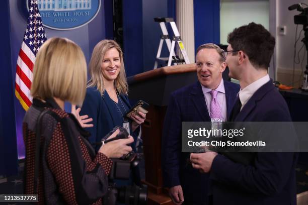 Former Press Secretary Sean Spicer speaks to White House staff after visiting his former office March 19, 2020 in Washington, DC. With Americans...