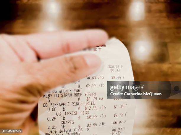 family’s grocery receipt - expense receipts stock pictures, royalty-free photos & images