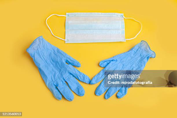 quarantine.  protection measures. mask and gloves.l - surgical glove stock pictures, royalty-free photos & images