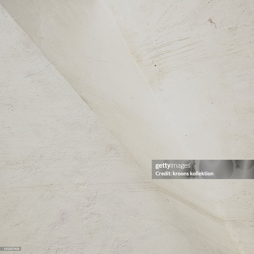 White painted plastered wall