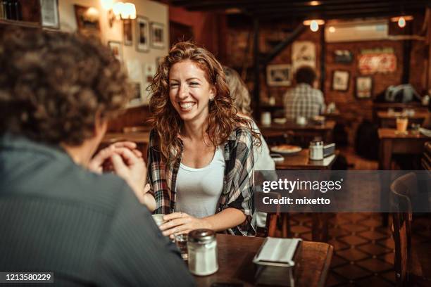 couple on a date in local cafeteria - argentina food imagens e fotografias de stock