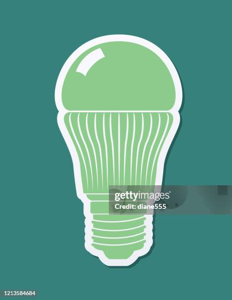 green light bulb icon sticker - led light bulb stock illustrations