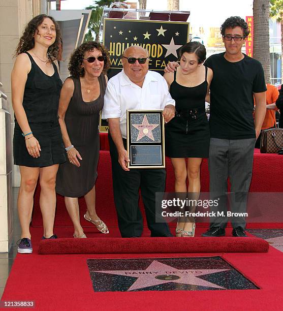 Actress Rhea Pearlman and actor Danny DeVito and their family pose for photographers during the installation ceremony for actor Danny DeVito's star...