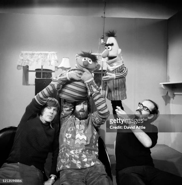Puppeteers Daniel Seagren holding and Jim Henson working Ernie, and Frank Oz with Bert rehearse for an episode of Sesame Street at Reeves TeleTape...