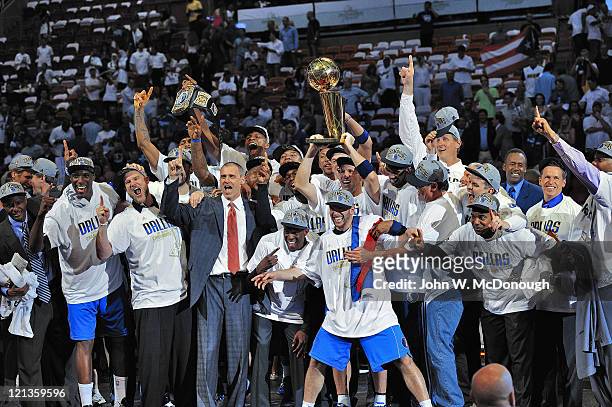 Finals: View of Dallas Mavericks team victorious with Larry O'Brien Championship trophy after winning Game 6 and championship series vs Miami Heat at...