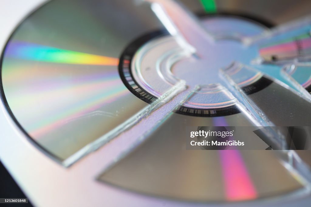 Broken Cd Reflection Sunlight High-Res Stock Photo - Getty Images