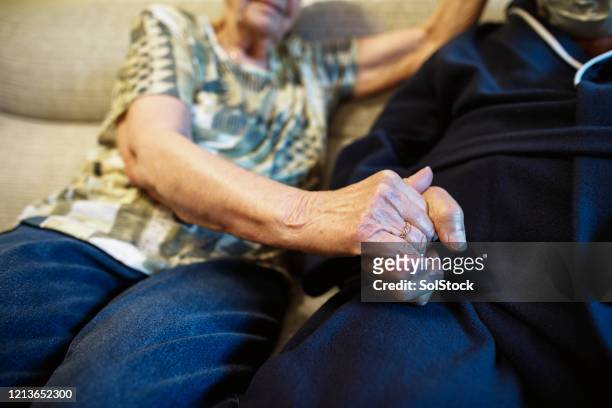 a tender moment of love - pneumonia elderly stock pictures, royalty-free photos & images