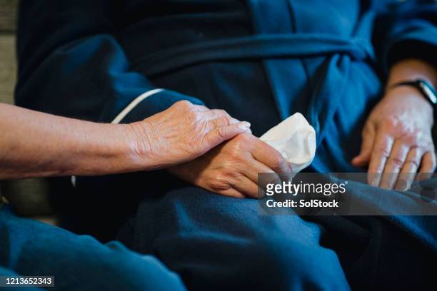 a caring touch - residential care stock pictures, royalty-free photos & images