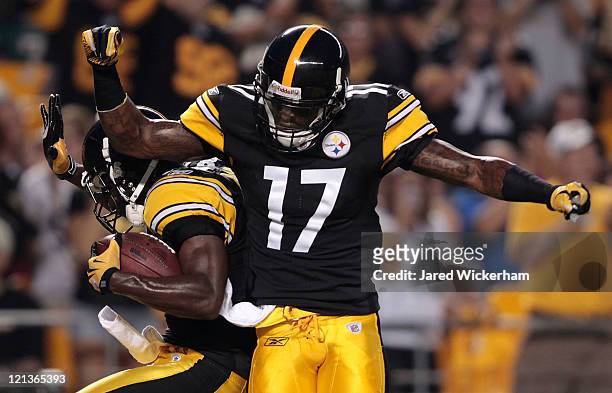 Antonio Brown and Mike Wallace of the Pittsburgh Steelers celebrate after Brown's touchdown against the Philadelphia Eagles during the preseason game...