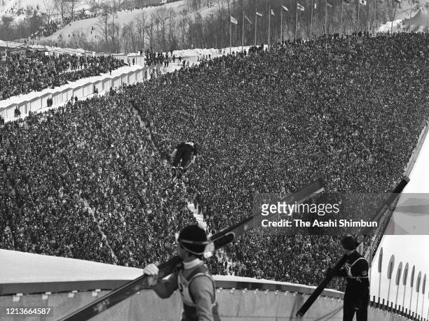 Full house crowd watch the Ski Jumping 90m during the Sapporo Winter Olympic Games at the Okurayama Jump Stadium on February 11, 1972 in Sapporo,...