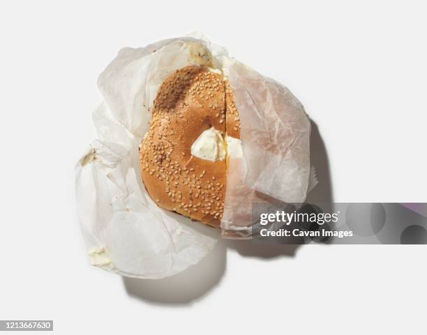 toasted sesame bagel with cream cheese - sandwich top view stock pictures, royalty-free photos & images