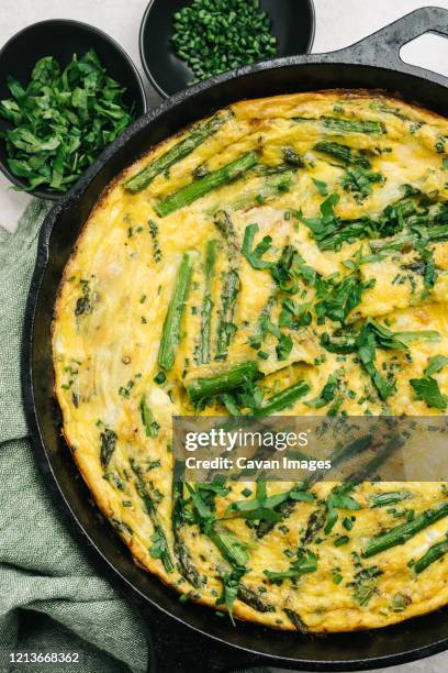 baked in skillet asparagus frittata still life - frittata stock pictures, royalty-free photos & images