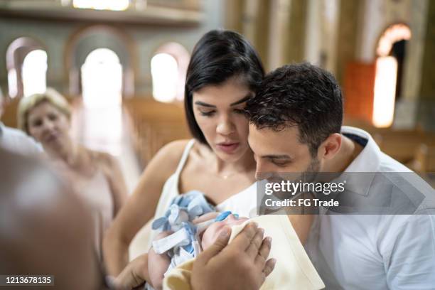 Baptism Routine Catholic Baptism Photos and Premium High Res Pictures - Getty Images