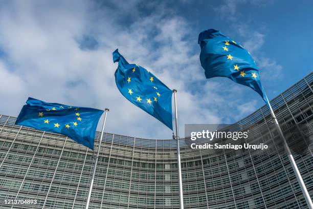 european union flags at berlaymont building - brussels capital region stockfoto's en -beelden