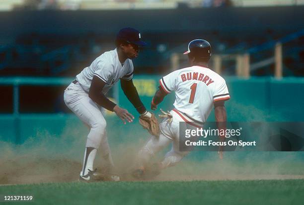 Willie Randolph of the New York Yankees puts the tag on Al Bumbry of the Baltimore Orioles during an Major League Baseball game circa 1981 at Yankee...