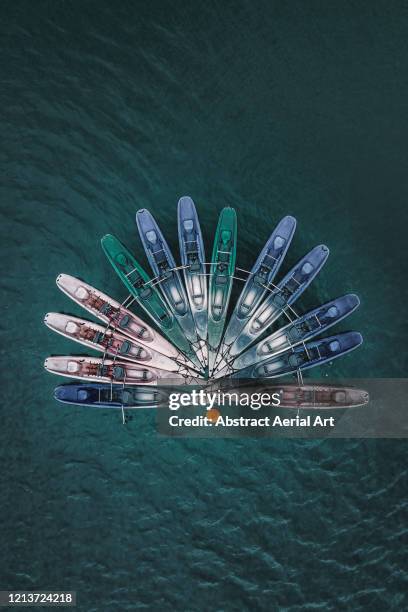 aerial image above kayaks moored in a reservoir, france - zusammenfügen stock-fotos und bilder