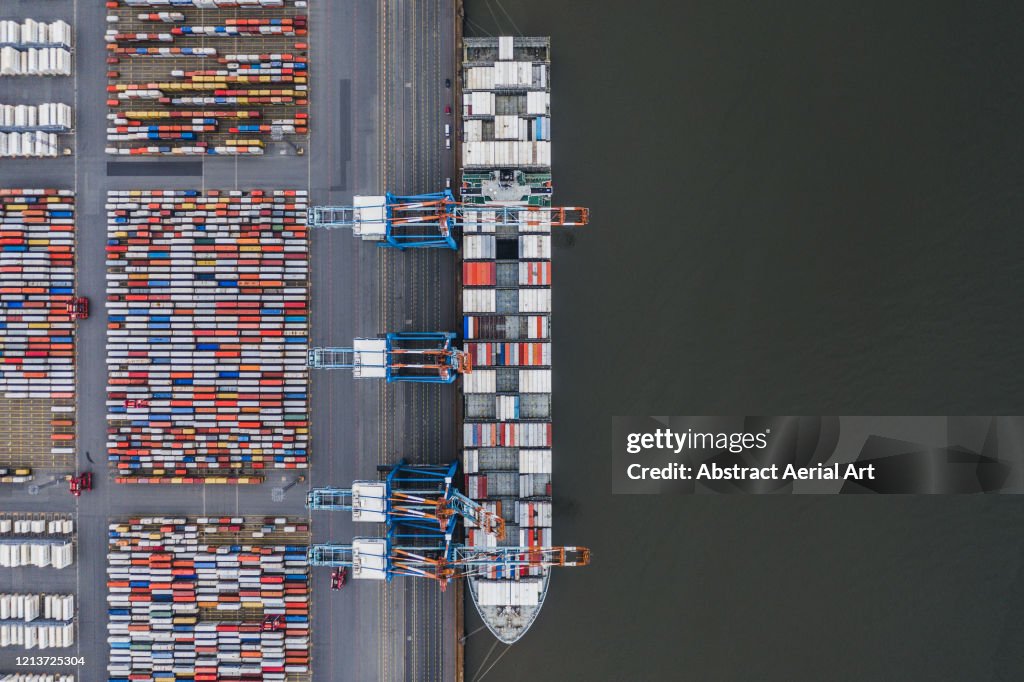 Container ship docked in port as seen from above, Germany