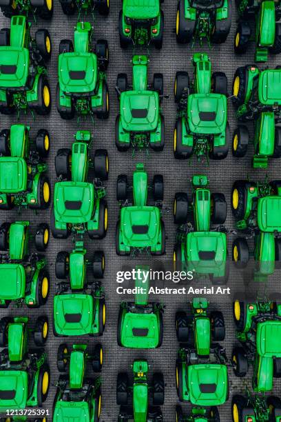 a group of brand new tractors photographed from above, germany - agricultural equipment bildbanksfoton och bilder