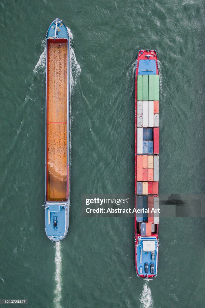 Aerial image showing two industrial ships side by side in the Rhine River, Karlsruhe, Germany