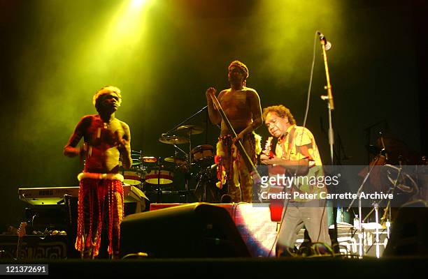 Mandawuy Yunupingu with the band Yothu Yindi performing on stage as the opening act for Carlos Santana during his 'Shaman' concert tour at Centennial...
