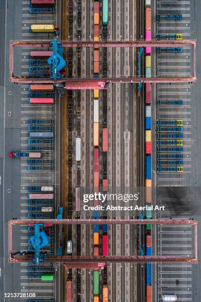 freight train loading area photographed from directly above, germany - train station stock-fotos und bilder