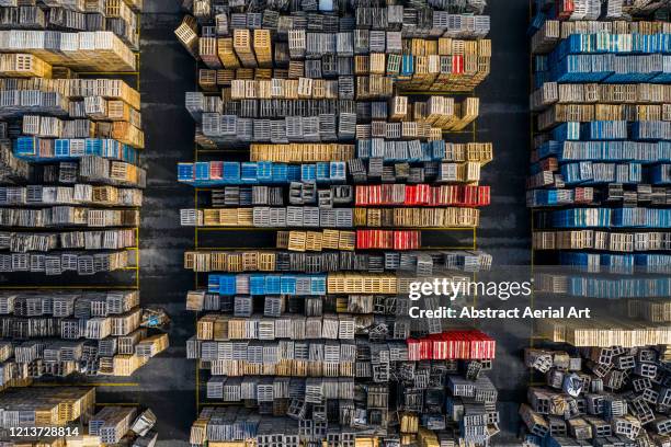 stacks of crates photographed from above, spain - different perspective stock-fotos und bilder